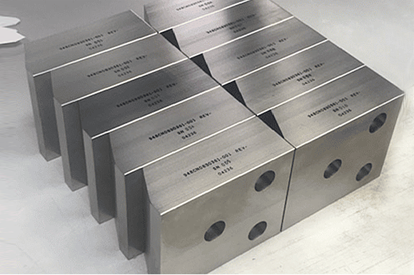 Tungsten ballast weights produced for the Space Launch System (Courtesy Elmet Technologies)