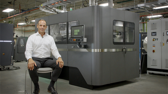 Paul Hauck, Chief Operating Officer for DSB Technologies, with the Desktop Metal Additive Manufacturing machines (Courtesy Desktop Metal/DSB Technologies)